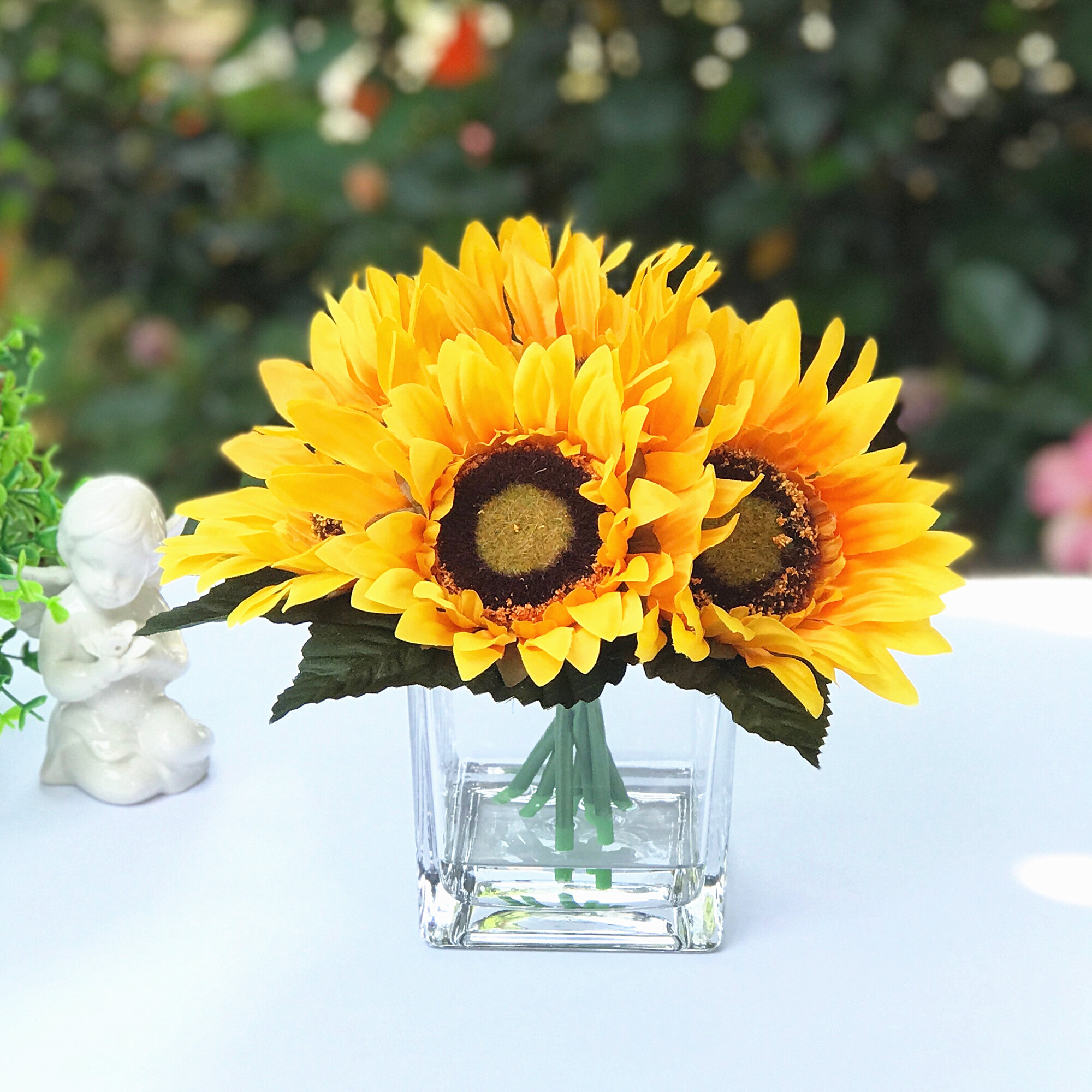 fake sunflowers in vase