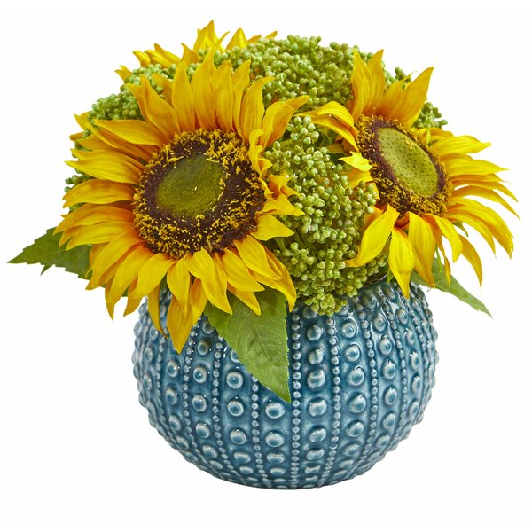 artificial sunflowers in vase