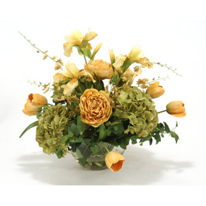 Traditional Floral Mix in Tones with Peony, Hydrangea, Iris, Tulips and Orchids in Round Glass Bowl