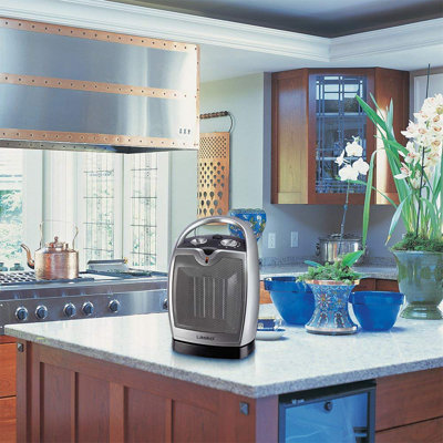 1,500 Watt Electric Fan Compact Heater with Adjustable Thermostat Lasko