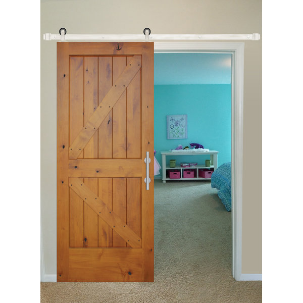 Rustic Knotty Alder Prefinished K Strap Solid Panelled Wood Interior Barn Door by Creative Entryways