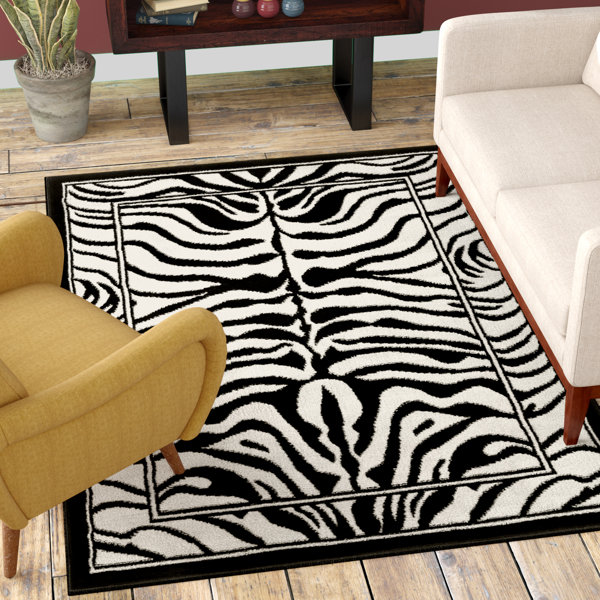 Kaly Zebra Print Ebony Area Rug by World Menagerie