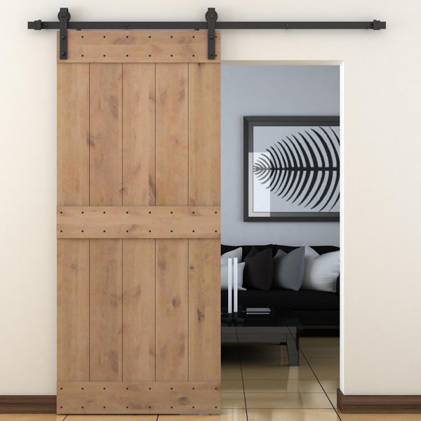 Bent Strap Sliding Door Track Hardware and Vertical Slat Primed Sliding Knotty Solid Wood Panelled Alder Slab Interior Barn Door by Calhome