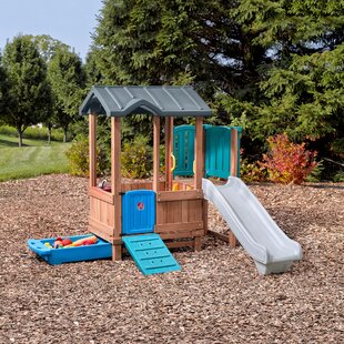 outdoor playhouse and slide