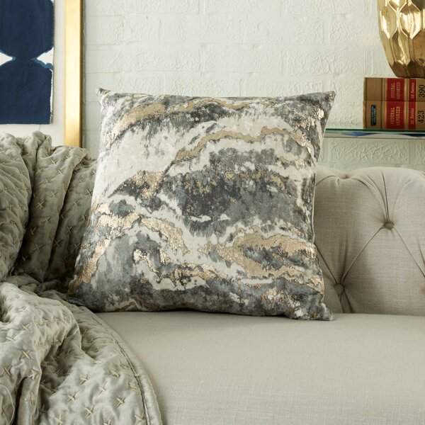 silver and gold decorative pillows