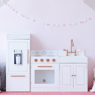 little girl play kitchen set