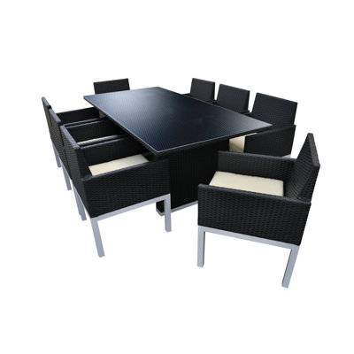 Tuum 9 Piece Dining Set with Cushions Solis Patio Finish: Black, Cushion Color: Beige