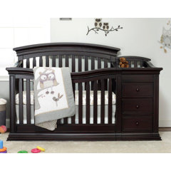 gray crib and changing table