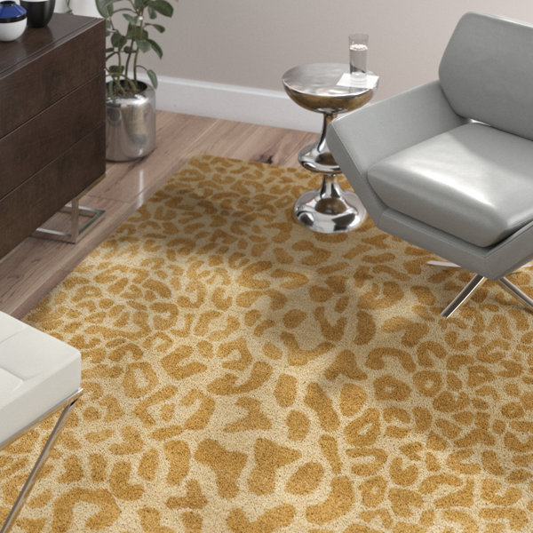 Macias Beige Animal Print Area Rug by Wade Logan