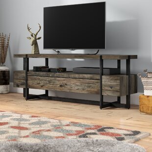 https://secure.img1-ag.wfcdn.com/im/31565848/resize-h310-w310%5Ecompr-r85/1265/126568298/Jorgensen+Solid+Wood+TV+Stand+for+TVs+up+to+75%22.jpg