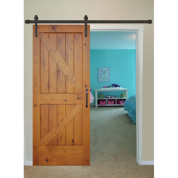Rustic Knotty Alder Prefinished K Strap Solid Panelled Wood Interior Barn Door by Creative Entryways