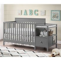 grey crib and changing table