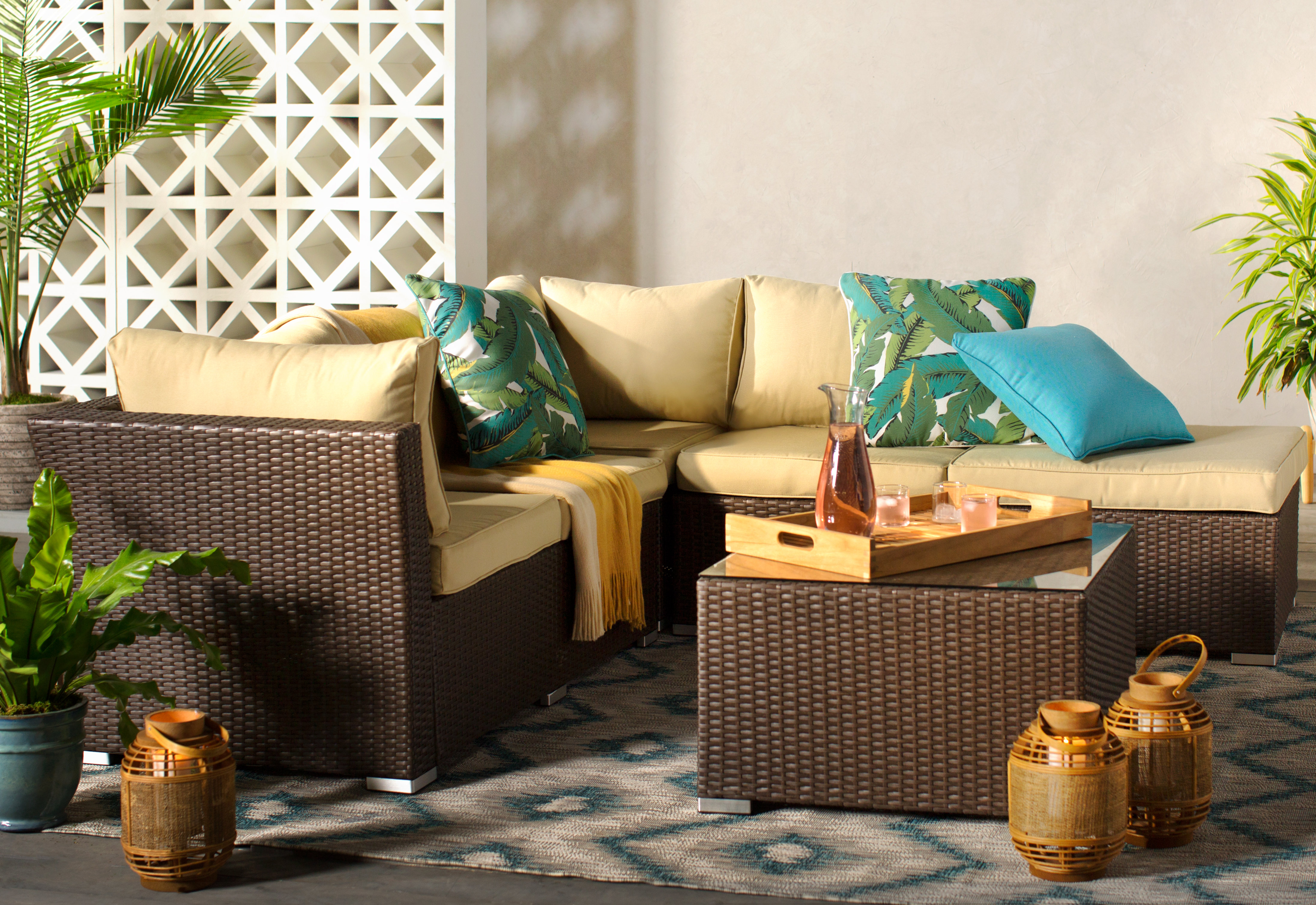 deck idea featuring a wicker outdoor conversation set