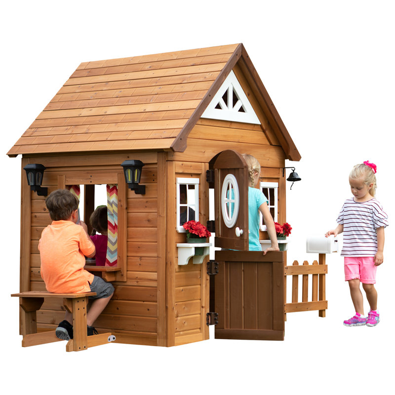 wooden playhouse with kitchen