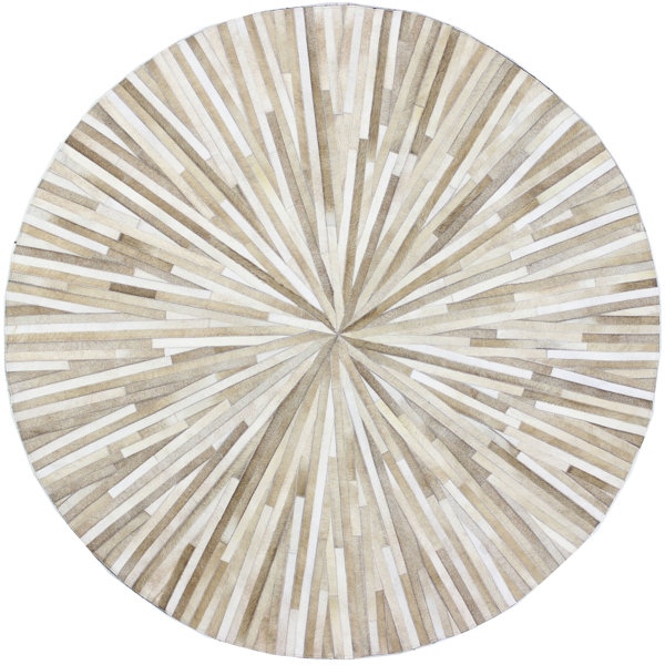 Davi Hand-stitched Cowhide Camel Indoor Area Rug by Wade Logan