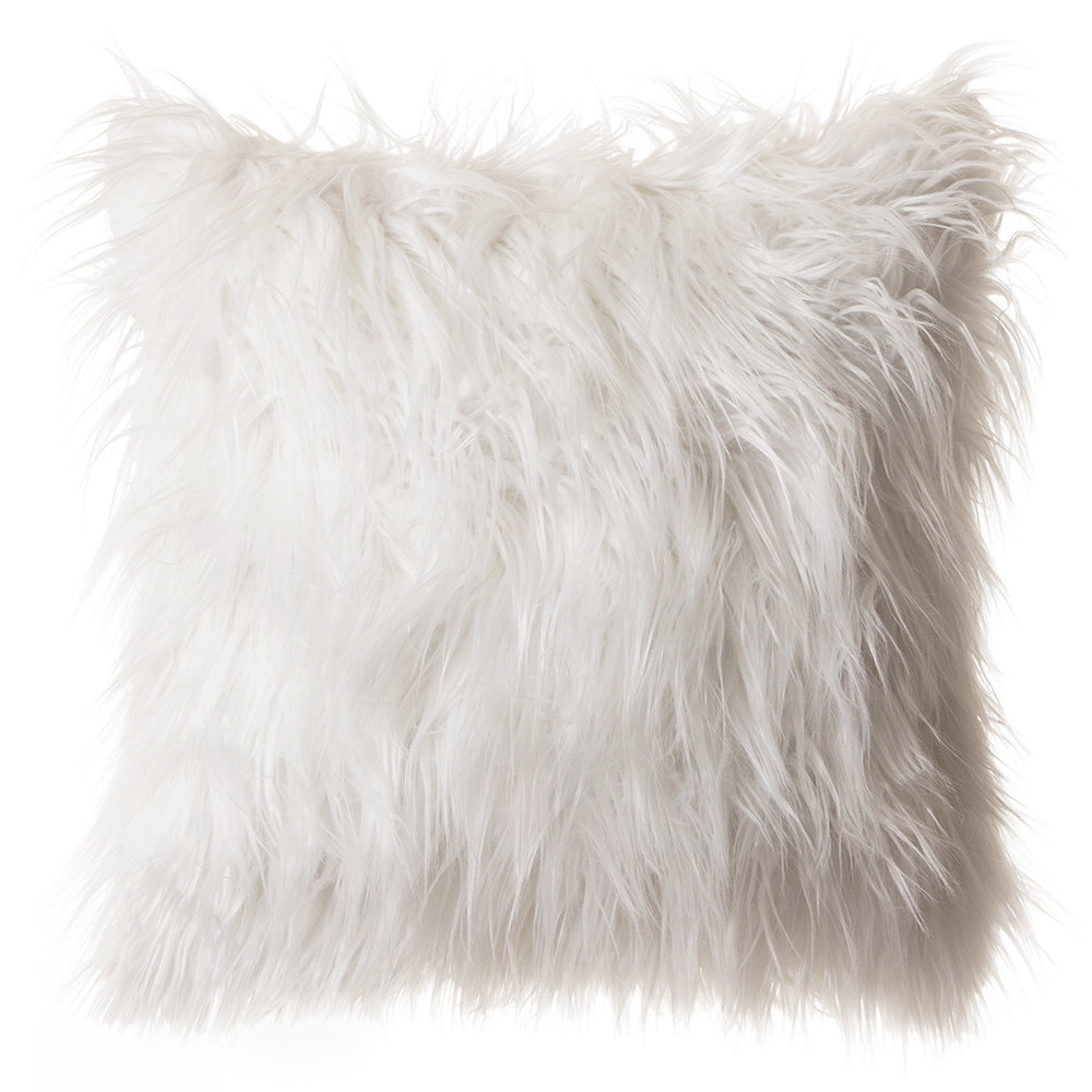 white fur cushion