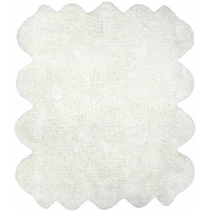Bigby Hand-Tufted Faux Sheepskin Natural Area Rug