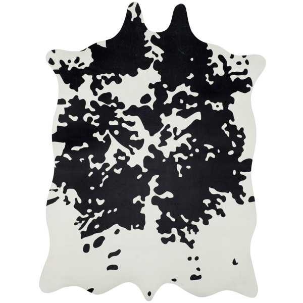 Faux Hide Hand-Tufted Black/White Area Rug by Safavieh