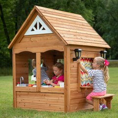 girls outside playhouse