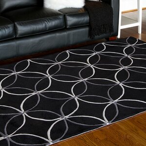 Conroy Black Area Rug