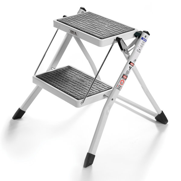 Polder Products LLC Folding 2 Step Plastic and Wood Step ... Crafted from heavy duty plastic and weighing just over 0.4kg folds nearly flat for easy storage.