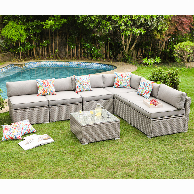 Wrought Studio Kemar 7 Piece Outdoor Furniture Set Warm Gray Wicker Sectional Sofa W Thick Cushions Glass Coffee Table 6 Floral Fantasy Pillows Reviews Wayfair