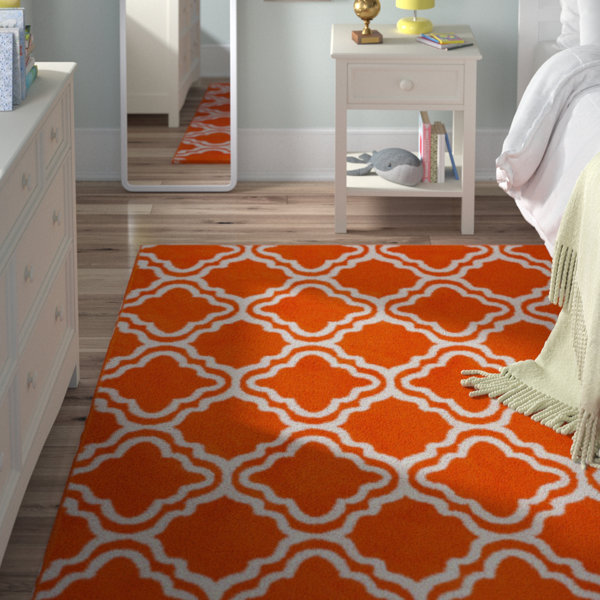 Kroeker Calipso Orange Area Rug by Viv + Rae