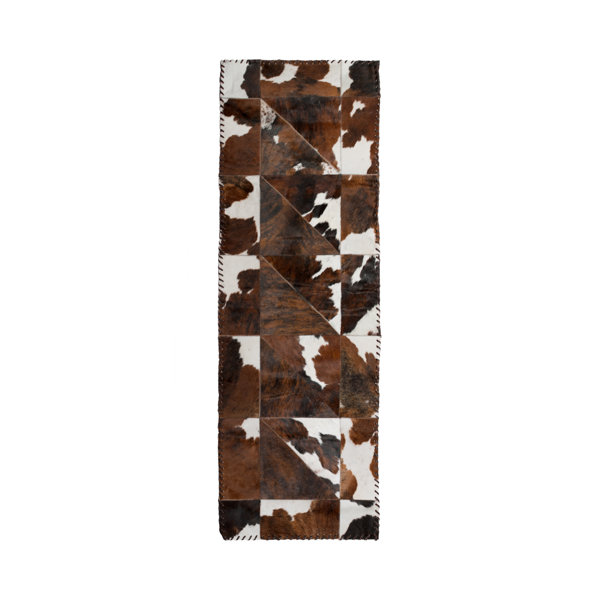 Danwood Stitch Hand-Woven Cowhide White/Chocolate Area Rug by Loon Peak