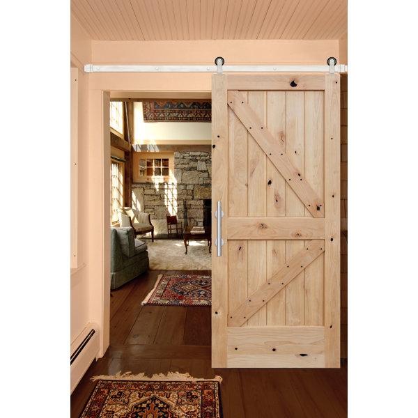 Rustic Knotty Alder Unfinished K Strap Solid Panelled Wood Interior Barn Door by Creative Entryways