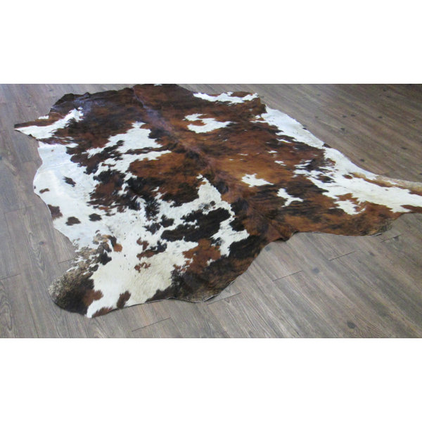 Lynnfield Hand Woven Cowhide Brown/White Area Rug by Loon Peak