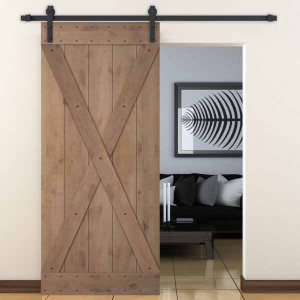 Bent Strap Sliding Door Track Hardware and X Overlay Primed Sliding Knotty Solid Wood Panelled Alder Slab Interior Barn Door by Calhome