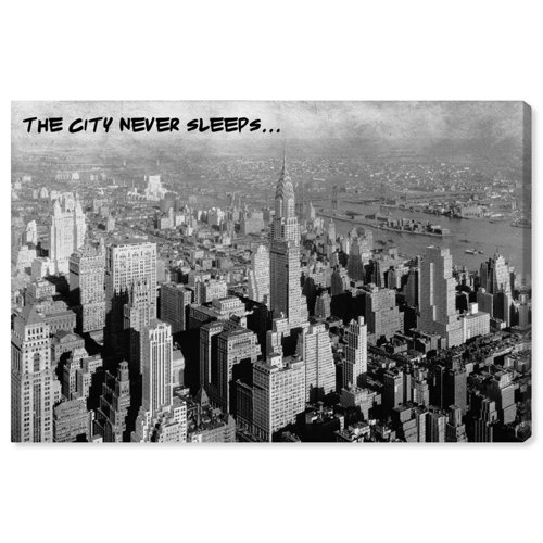 ' Never Sleeps' Graphic Art Print on Canvas East Urban Home Size: 25.4 cm H x 38.1 cm W