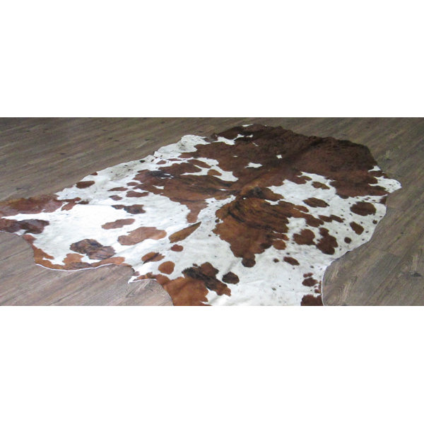 Lynnfield Hand Woven Cowhide Brown/White White Area Rug by Loon Peak