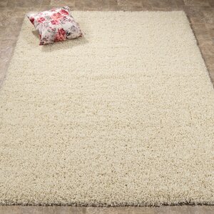 Ultimate Shaggy Ivory Solid Area Rug