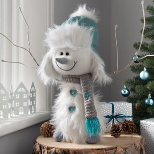 Dekorative Weihnachtsfigur "Sitzender Schneemann" mit LED Beleuchtung warm-weiß