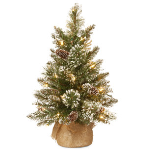 small pre decorated artificial christmas trees