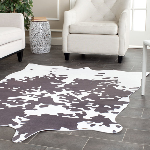 Faux Hide Hand-Tufted Gray/White Area Rug by Safavieh