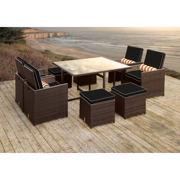 Stella II Patio Rattan 9 Piece Dining Set with Cushions and Cylinder Toss Pillows