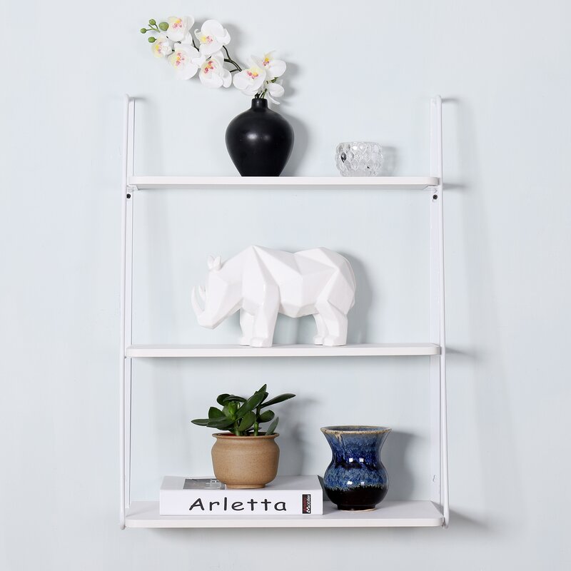 white wall shelves with hooks