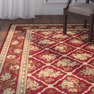 Taufner Red Area Rug