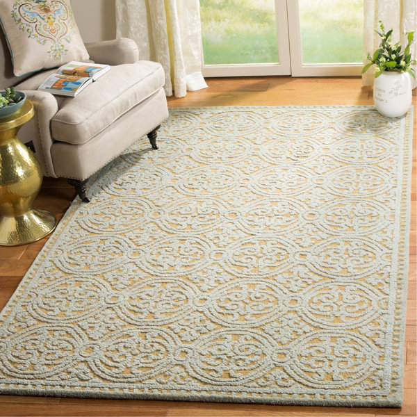 Charlenne Hand-Tufted Blue/Gold Area Rug by Zipcode Design