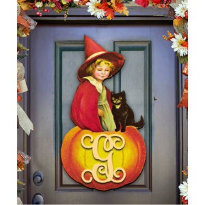 Personalized Single Letter Holiday Child and Black Cat Sitting on a Pumpkin Wooden Wall Decor
