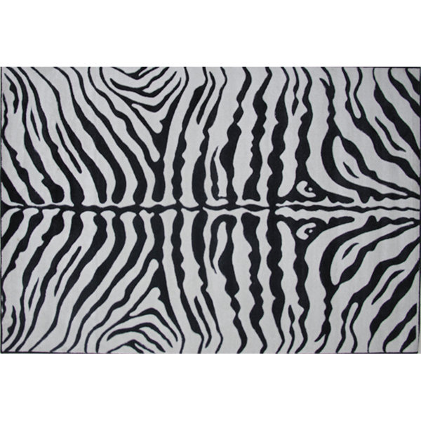 Supreme Zebra Skin Machine Woven Black/White Area Rug by Fun Rugs