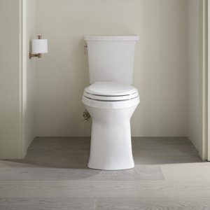 Corbelle Comfort Heightu00ae Two-Piece Elongated 1.28 GPF Toilet with Skirted Trapway and Revolution 360u2122 Swirl Flushing Technology and Left-Hand Trip Lever