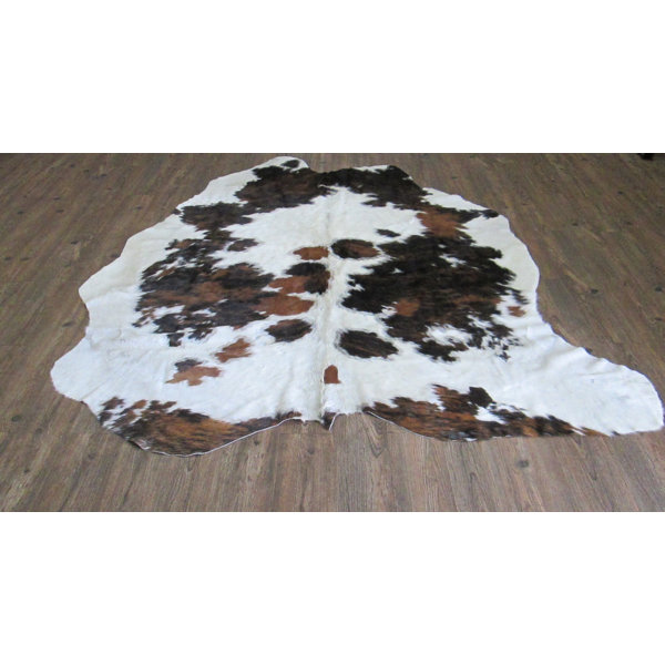 Verlaine Hand-Woven Cowhide White/Black Area Rug by Loon Peak