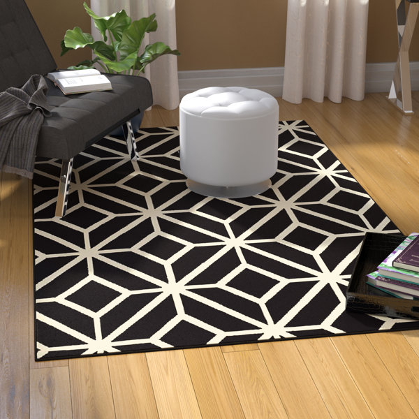 Pleione Black Indoor/Outdoor Area Rug by Wrought Studio