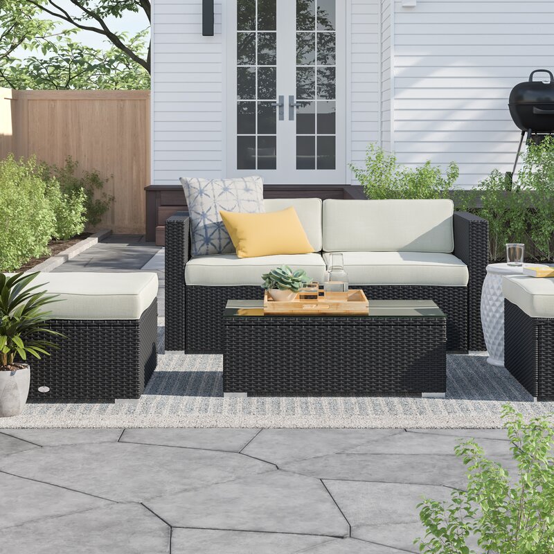 Hazen 5 Piece Rattan Sectional Seating Group with Cushions