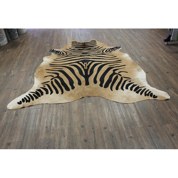 Ducote Stenciled Zebra Hair-on Hand-Woven Cowhide Black/Camel Area Rug by Bloomsbury Market