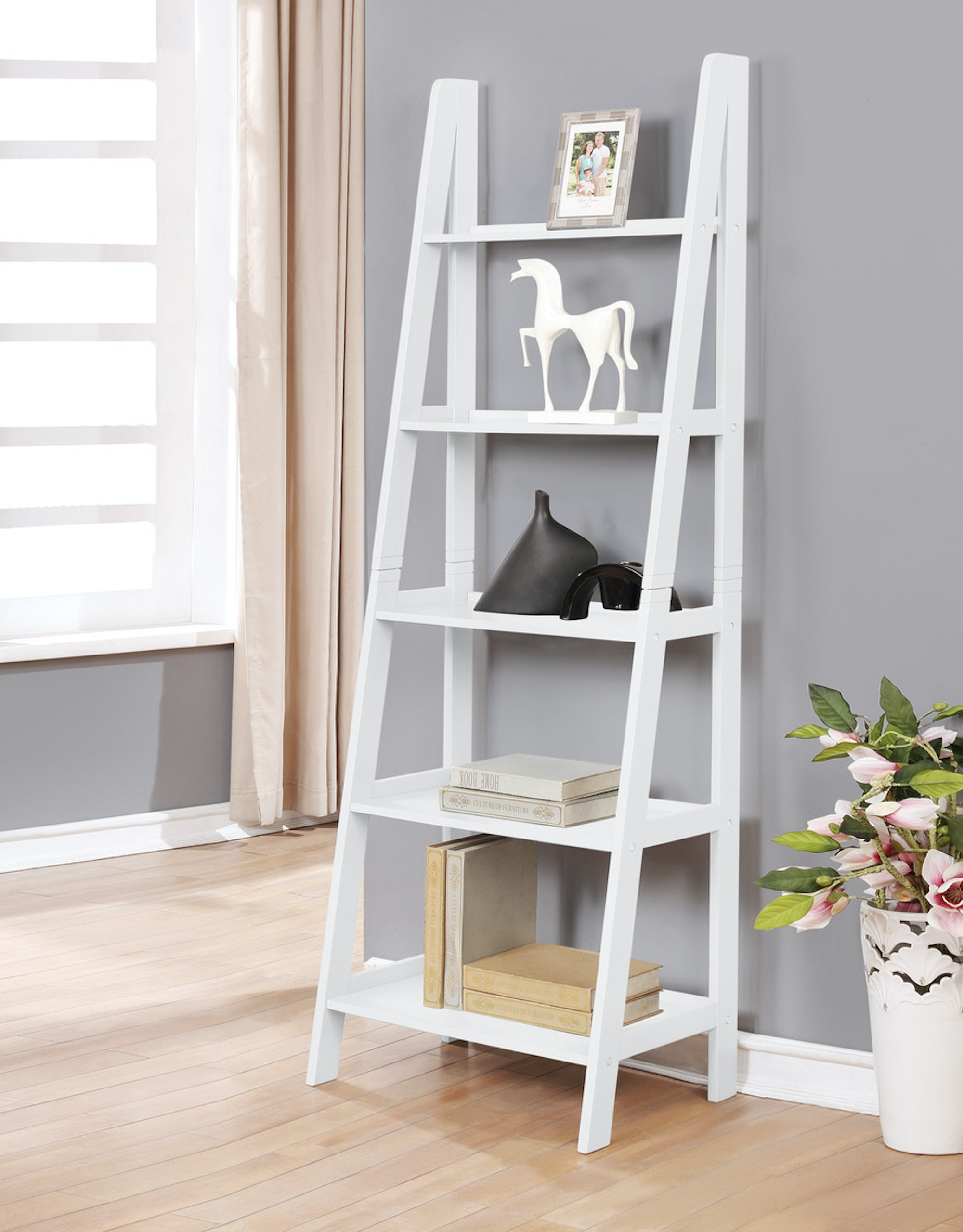 ladder shelf in front of window