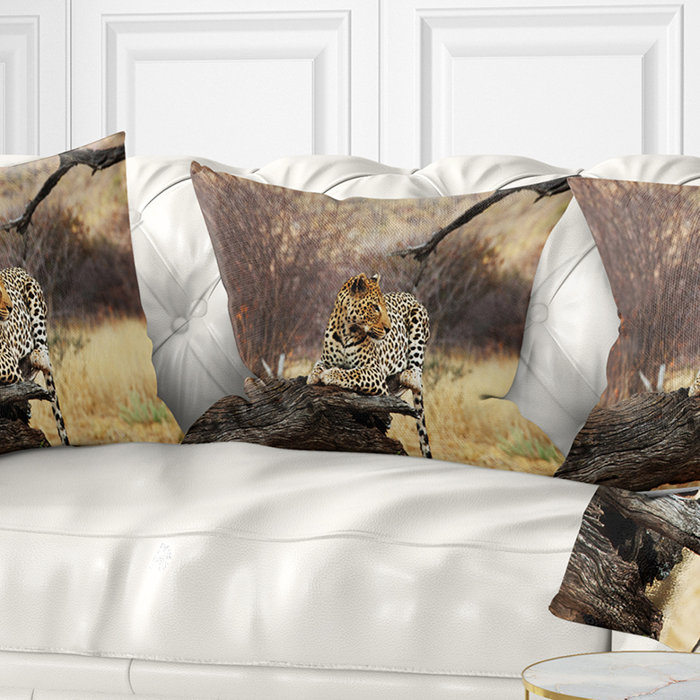 East Urban Home Leopard Sitting On Tree Trunk African Pillow